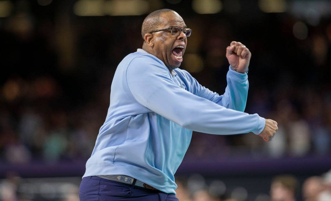 North Carolina head coach Hubert Davis reacts after R.J. Davis drew a foul from Kansas’ Remy Martin with the score tied 57-57 in the second half during the NCAA Championship game on Monday, April 4, 2022 at Caesars Superdome in New Orleans, La. Robert Willett/rwillett@newsobserver.com