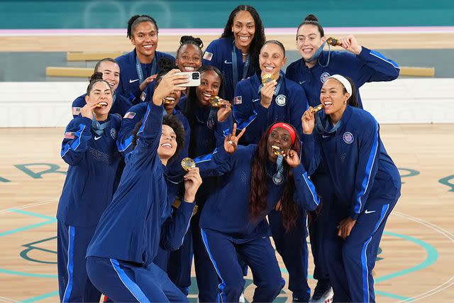 <p>Garrett W. Ellwood/NBAE via Getty</p> The USA Women's National Basketball Team