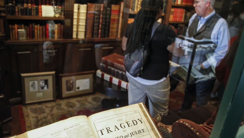 Reid N. Moon, owner of Moon’s Rare Books, shows Tiffany Rocque, a C-SPAN producer/videographer, around his Provo bookstore on Monday, June 6, 2016.