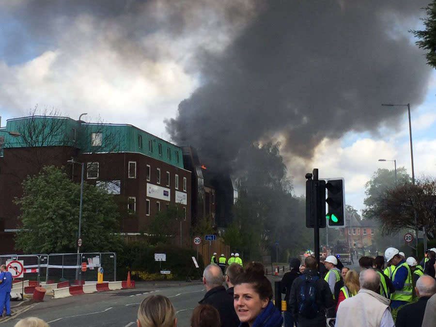 Smoke billows from the cancer research unit of Christie hospital in Manchester: Will Huntington / Twitter