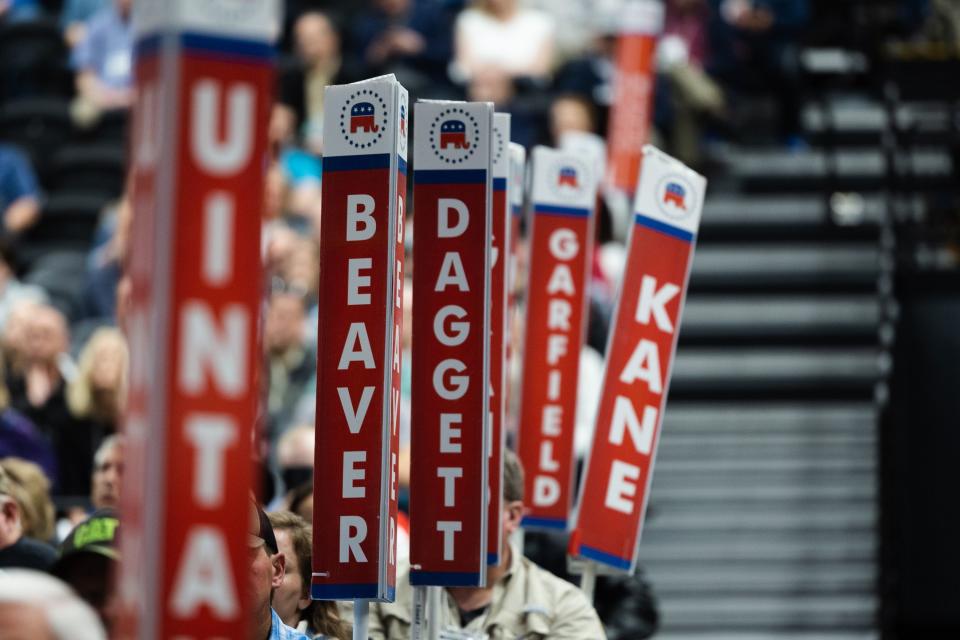 Signs displaying county names stand during the Utah Republican Party Organizing Convention at Utah Valley University in Orem on April 22, 2023. | Ryan Sun, Deseret News