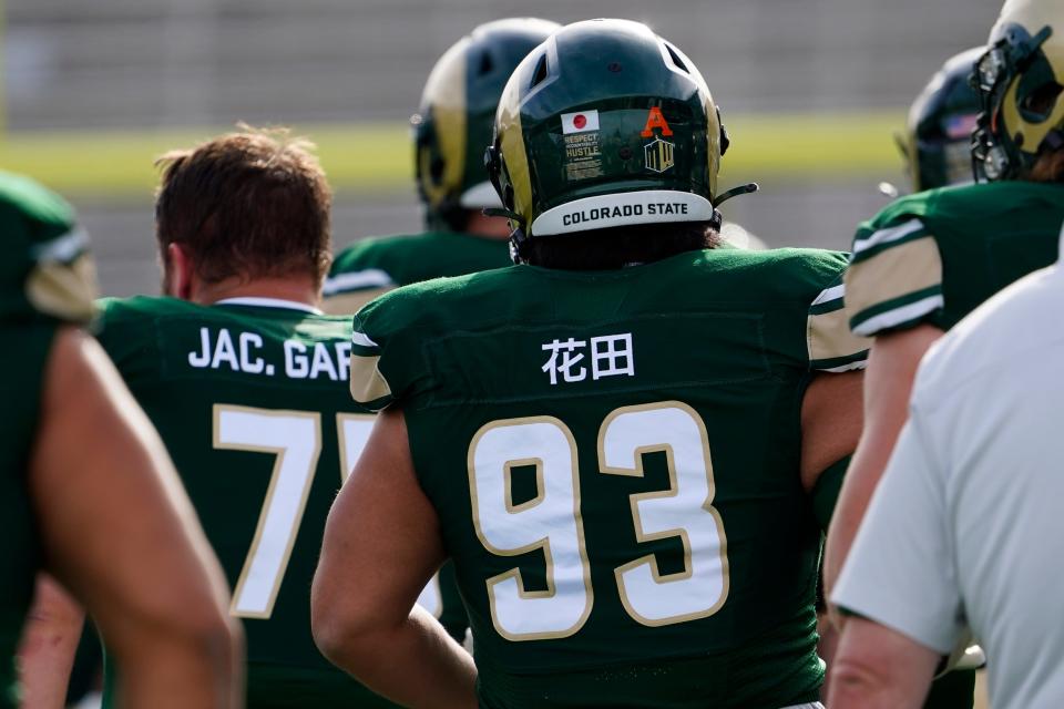 Colorado State Rams defensive lineman Hidetora Hanada (93) has his name written in Japanese characters on his jersey at Sonny Lubick Field at Canvas Stadium.