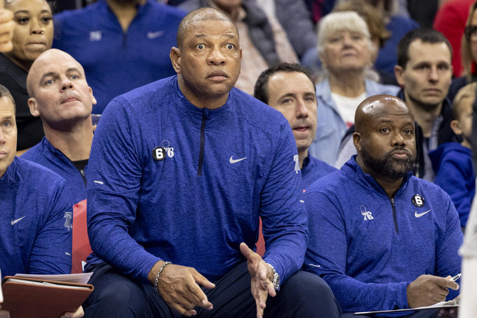 Philadelphia 76ers head coach Doc Rivers watches from the bench in the first half of an NBA basketball game against the San Antonio Spurs, Saturday, Oct. 22, 2022, in Philadelphia. (AP Photo/Laurence Kesterson)