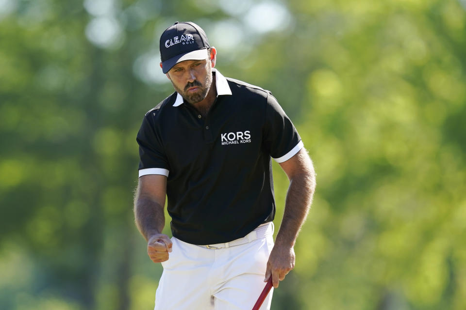 Charl Schwartzel, of South Africa, reacts after making his putt on the 15th green during the final round of the PGA Zurich Classic golf tournament at TPC Louisiana in Avondale, La., Sunday, April 25, 2021. (AP Photo/Gerald Herbert)