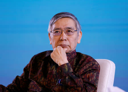 FILE PHOTO: Bank of Japan governor Haruhiko Kuroda attends a seminar at the International Monetary Fund - World Bank Group Annual Meeting 2018 in Nusa Dua, Bali, Indonesia October 13, 2018. REUTERS/Johannes P. Christo