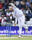England's Jack Leach bowls a delivery during the fourth day of the third cricket test match between England and New Zealand at Headingley in Leeds, England, Sunday, June 26, 2022.. (AP Photo/Rui Vieira)
