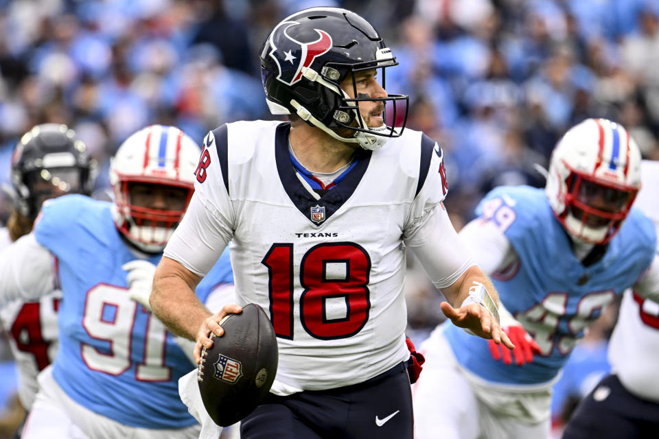 Houston Texans quarterback Case Keenum (18) works in the pocket against the Houston Texans during the first half of an NFL football game, Sunday, Dec. 17, 2023, in Nashville, Tenn. (AP Photo/John Amis)