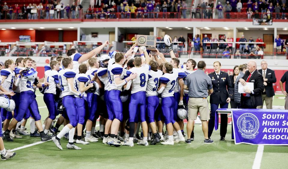 The Elk Point-Jefferson Huskies celebrate after winning their first State Championship in school history against Winner during the SDHSAA 11B State Championship game Friday November 11th, 2022 in Vermillion, SD.  Elk Point-Jefferson won 21-14.