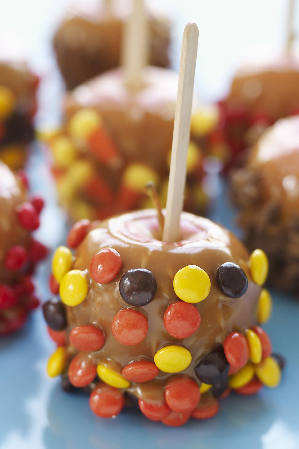 <p>These outrageously gooey and rich caramel apples make a sugar-loaded treat for a Halloween bash.</p><p>Get the <strong><a href="https://www.goodhousekeeping.com/food-recipes/a4758/outrageous-caramel-apples-855/" rel="nofollow noopener" target="_blank" data-ylk="slk:Outrageous Caramel Apples recipe;elm:context_link;itc:0;sec:content-canvas" class="link ">Outrageous Caramel Apples recipe</a></strong>.</p>