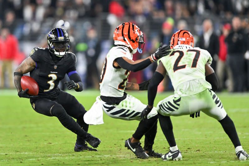 Baltimore Ravens wide receiver Odell Beckham Jr. (L) earns a first down against the Cincinnati Bengals on Sunday at M&T Bank Stadium in Baltimore. Photo by David Tulis/UPI