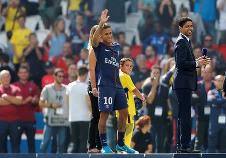 Soccer Football - Paris St Germain vs Amiens SC - Ligue 1 - Paris, France - August 5, 2017 PSG chairman Nasser Al-Khelaifi (R) with Neymar during the presentation REUTERS/John Schults