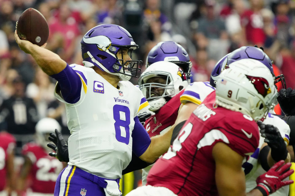 Minnesota Vikings quarterback Kirk Cousins (8) throws against the Arizona Cardinals during the first half of an NFL football game, Sunday, Sept. 19, 2021, in Glendale, Ariz. (AP Photo/Rick Scuteri)