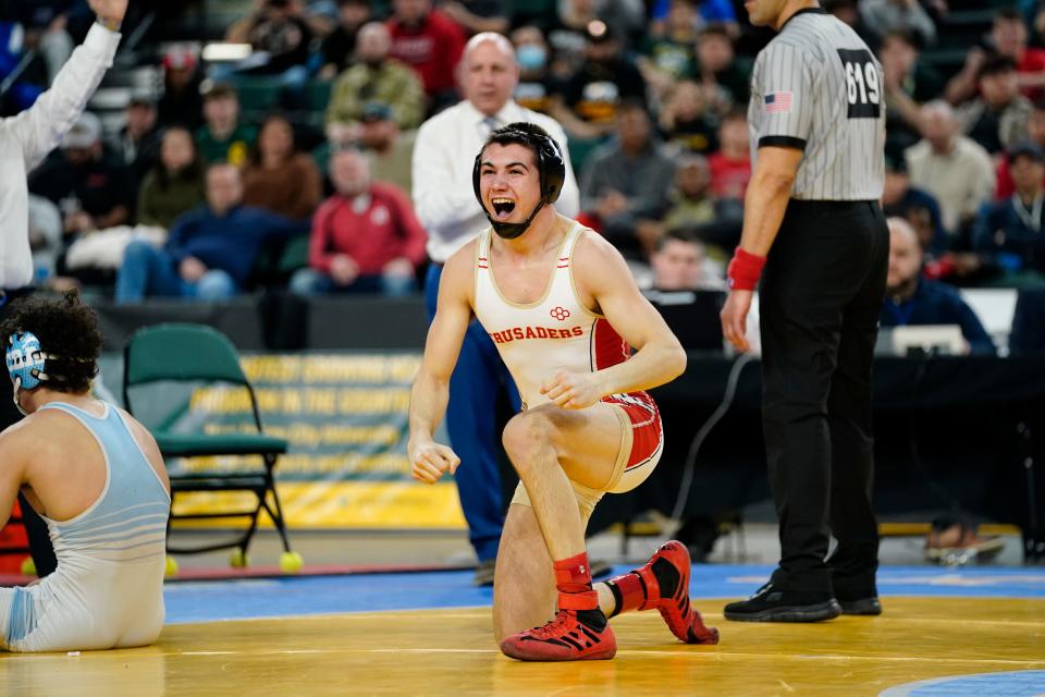 Joseph Cangro of Bergen Catholic wins by fall over Julian George of Christian Brothers Academy (far left) in the 138-pound final on Day 3 of the NJSIAA state wrestling championships in Atlantic City on Thursday, March 5, 2022.