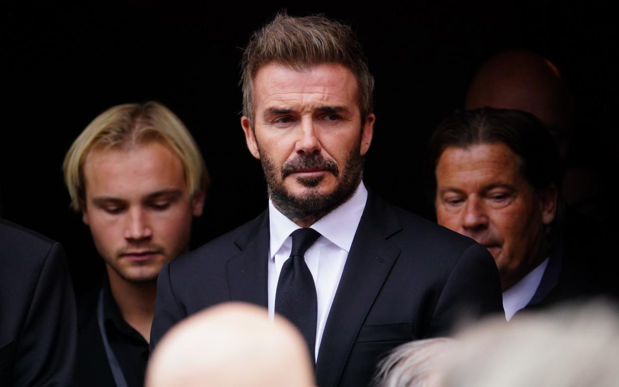 David Beckham - Sven-Goran Eriksson funeral: Candle in the Wind plays as David Beckham joins mourners