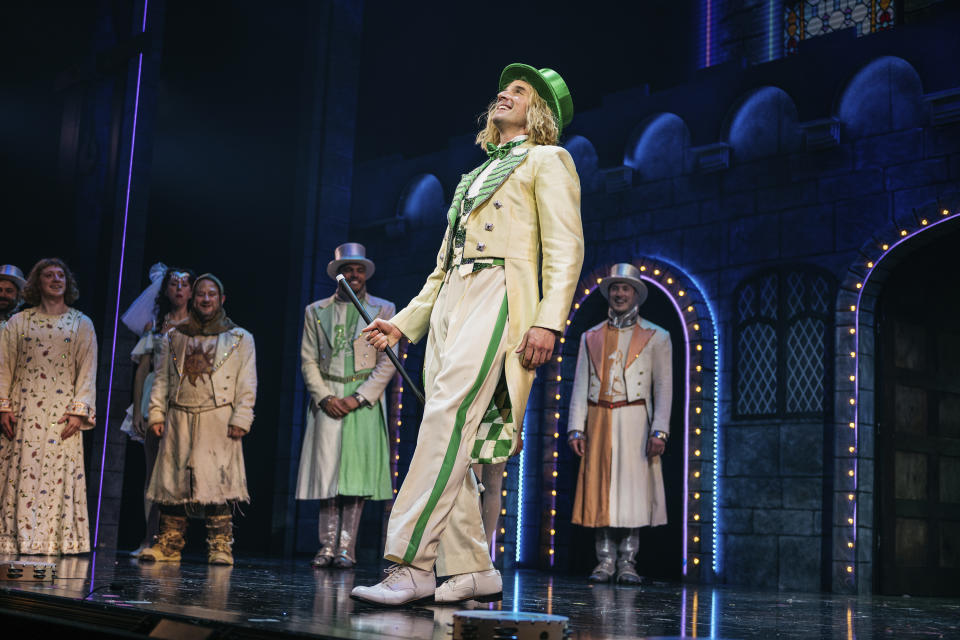 This image released by Polk & Co. shows Michael Urie during a performance of "Spamalot." (Andy Henderson/Polk & Co. via AP)