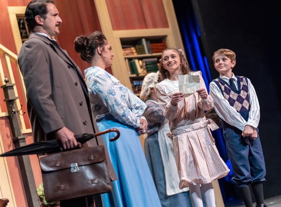 The Banks family — Ashley Fox as George, Molly Humphries as Winifred, Sophia Bernard as Jane and Adrian Stukey as Michael — look for the “perfect nanny” in a scene from “Mary Poppins” at the Croswell Opera House.