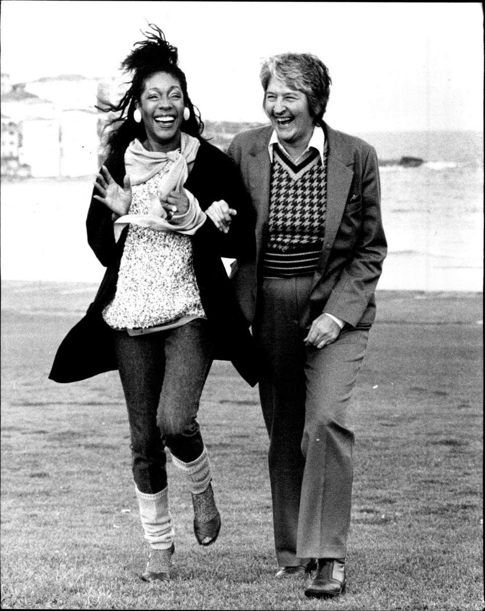 Mary Wilson and Dawn Fraser walk in Australia on June 22, 1983.