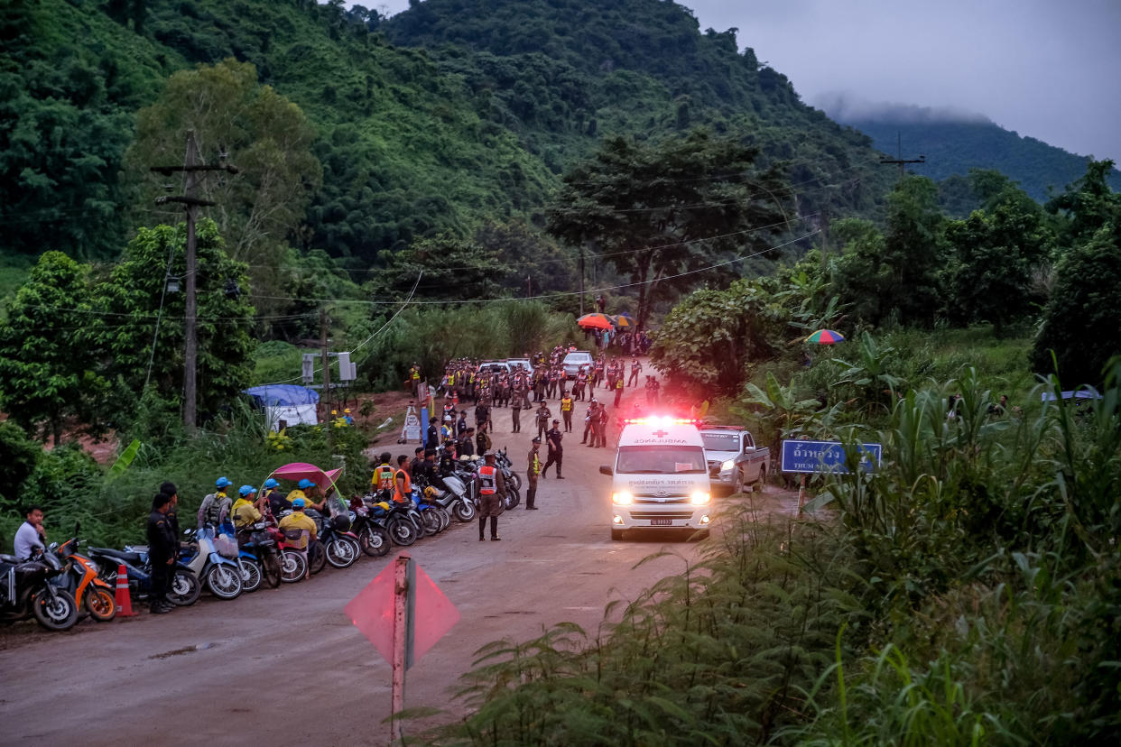 An ambulance carrying one of the soccer players rescued from Tham Luang Nang Non cave in Thailand heads to a hospital on July 8. All 12 boys and their coach were extricated from the cave by July 10. (Linh Pham / Getty Images)