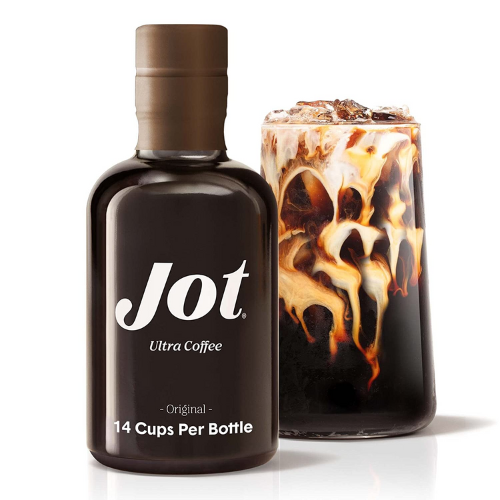 Jot organic coffee concentrate with glass of iced coffee behind it