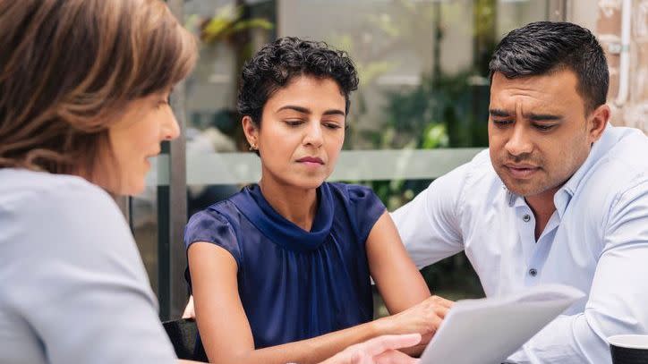 A financial advisor goes over the results of the gap analysis she conducted for two clients. 