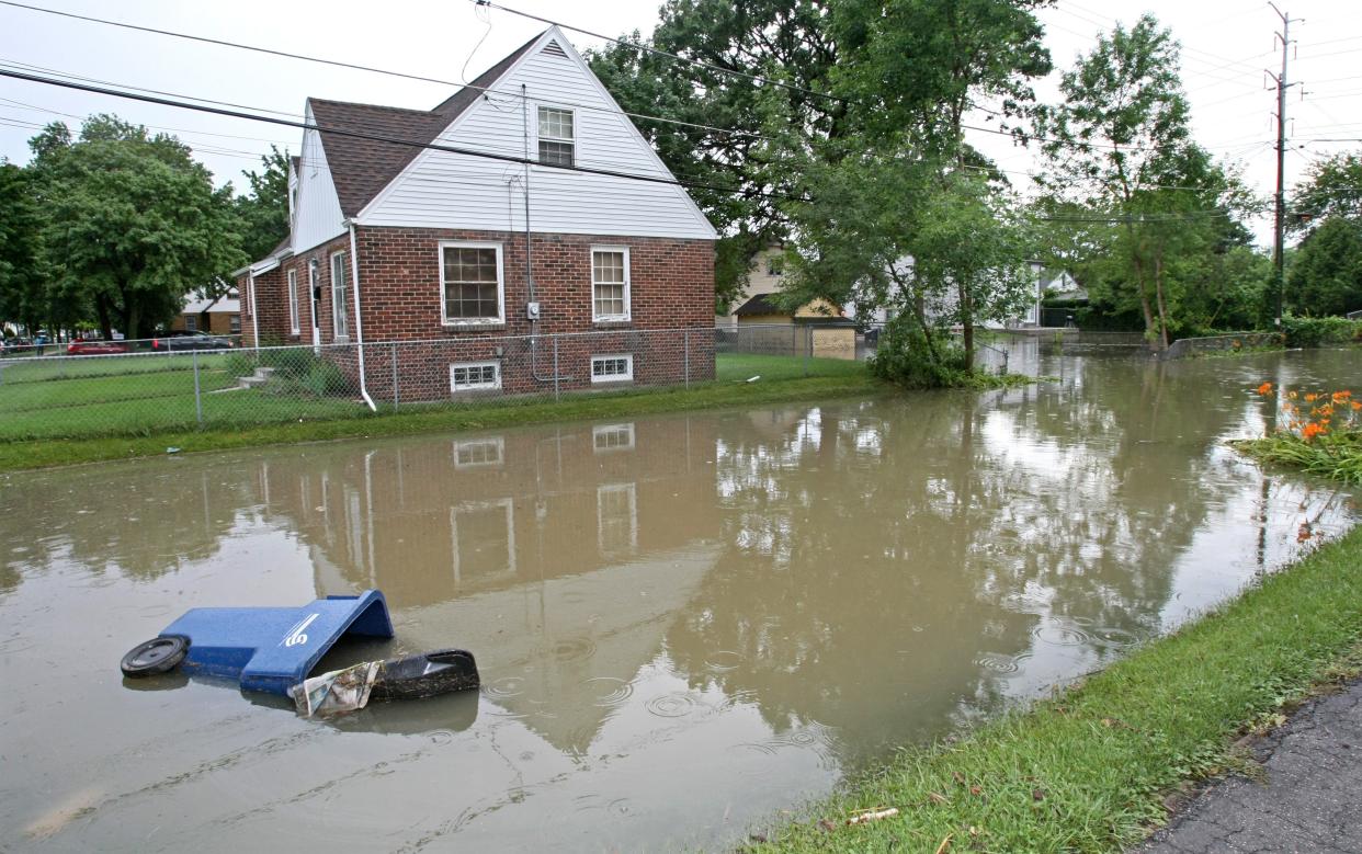 Standing water remains in this area along the 5000 block of  N. 19th Place in Milwaukee in summer 2010. In the same area at least 7 basements collapsed.