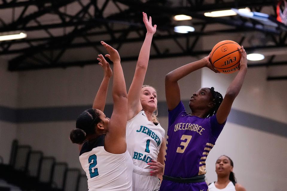 Okeechobee’s Semaj Jasper takes a shot against Jensen Beach in a girls basketball game Tuesday, Jan. 18, 2022, in Jensen Beach High School. Okeechobee won 55-42.