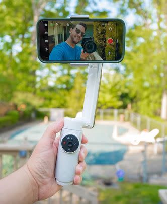 An extremely nifty, oh-so-portable AI-powered smartphone stabilizer to give you the most seamless, cinematic shots of all the beautiful sights you're beholding