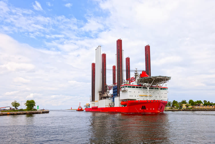 <span class="caption">Specialist ships are needed to build offshore wind turbines.</span> <span class="attribution"><span class="source">Nightman1965 / shutterstock</span></span>