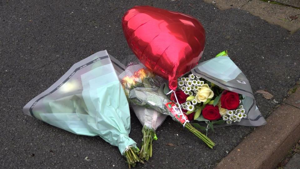 Double stabbing Thamesmead Abbey Wood: Floral tributes left at Titmuss Avenue in Thamesmead (PA)