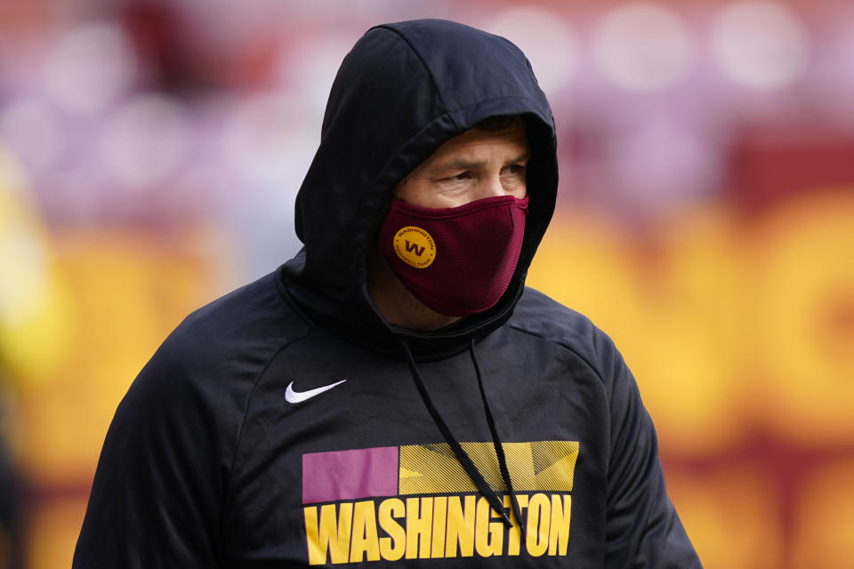 Washington Football Team head coach Ron Rivera walking on the field before the start of an NFL football game against the Seattle Seahawks, Sunday, Dec. 20, 2020, in Landover, Md. (AP Photo/Susan Walsh)