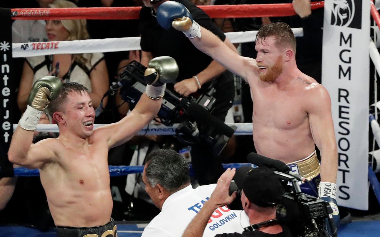 Both Canelo Alvarez, right, and Gennady Golovkin celebrate following the middleweight title fight in Las Vegas  - FR159466 AP