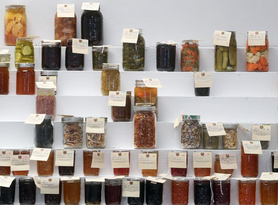 Canning and preserves entries await judging during the setup of the Kitsap County Fair and Stampede on Monday.