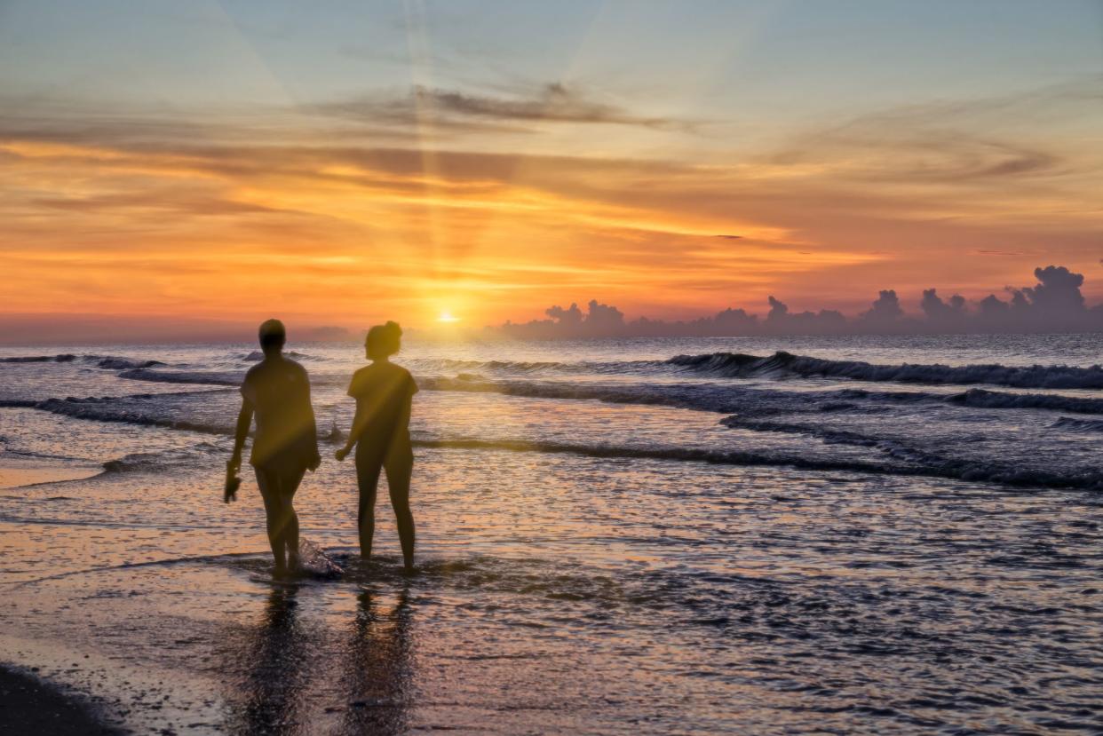 early morning beach activity in a happy vacation scene in Myrtle Beach, SC.