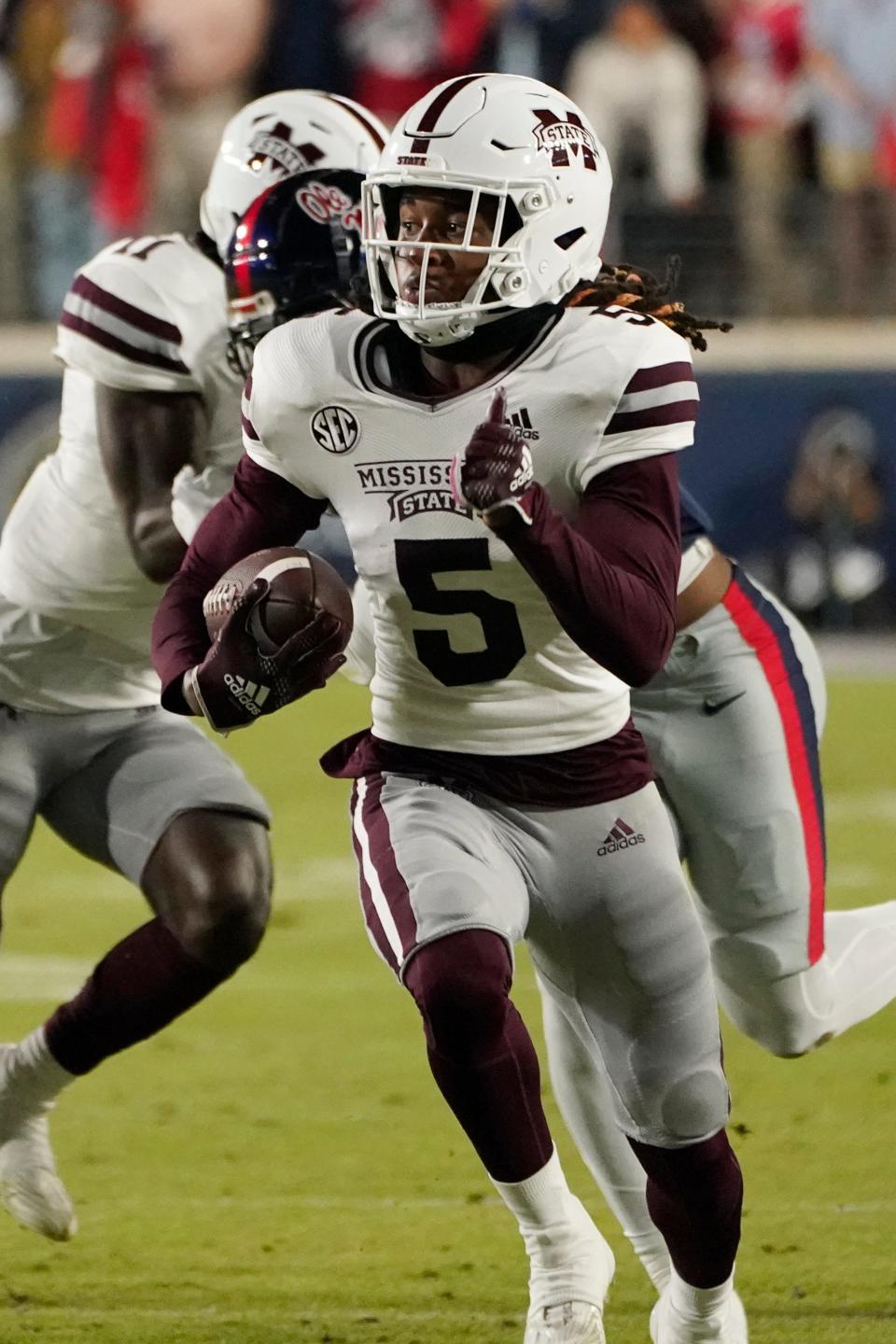 Mississippi State wide receiver Lideatrick Griffin (5) runs after a reception against Mississippi during the first half of an NCAA college football game in Oxford, Miss., Thursday, Nov. 24, 2022. (AP Photo/Rogelio V. Solis)