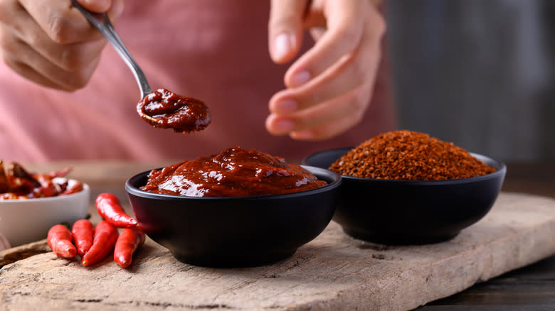 Person cooking with gochjang