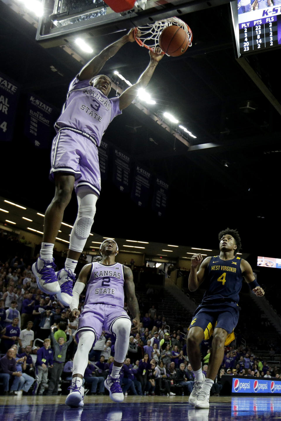Kansas State's DaJuan Gordon dunks the ball during the second half of an NCAA college basketball game against West Virginia Saturday, Jan. 18, 2020 in Lawrence, Kan. Kansas State won 84-68. (AP Photo/Charlie Riedel)
