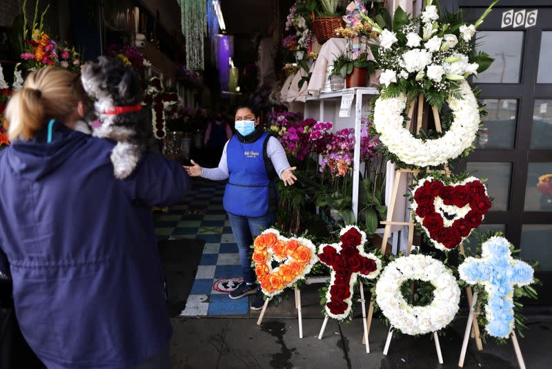 A woman shops at a florist ahead of Valentine's Day in Los Angeles