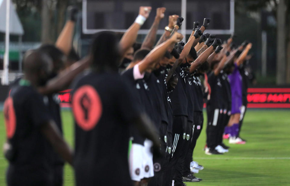 Orlando City, Inter Miami and members of the Black Players for Change coalition staged a powerful protest before MLS kicked off again Wednesday night. (Photo courtesy of the MLS via Getty Images)