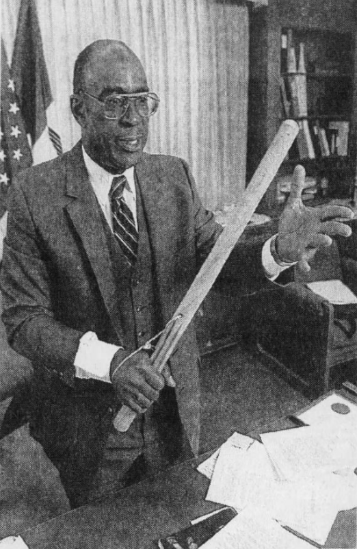 Crispus Nix wields the riot baton he used in 1982 to help regain control of an Iowa State Penitentiary cellblock from inmates several months after he became warden. He retired in 1993.