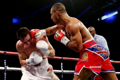 Kell Brook (R) finishes Vyacheslav Senchenko with a right hook on Oct. 26, 2013 in Sheffield, England. (Getty)