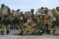 Russian paratroopers take part in drills at a military aerodrome in Taganrog