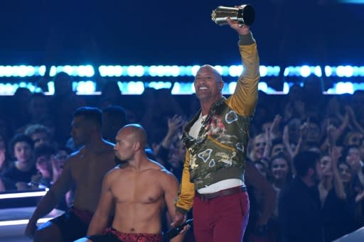 Wrestler-turned-actor Dwayne "The Rock" Johnson was honored with a Generation Award