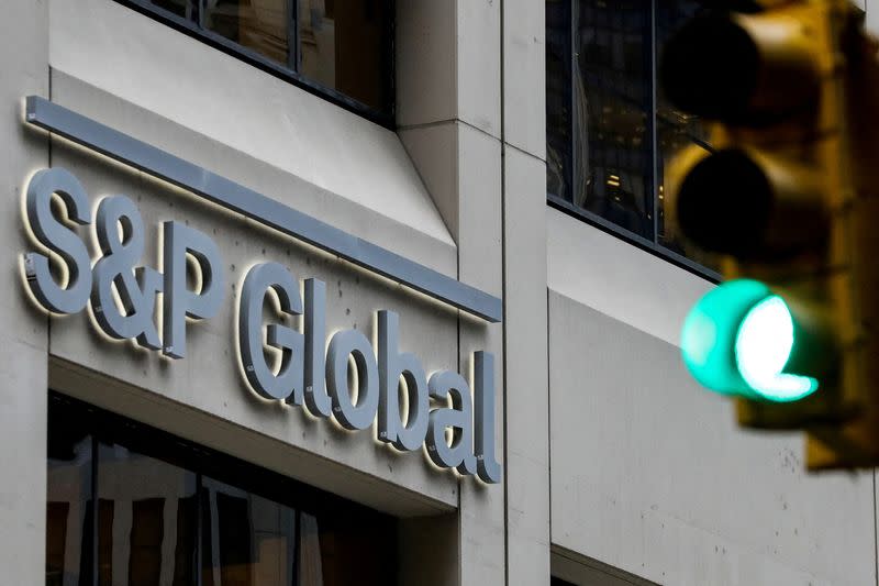 FILE PHOTO: The S&P Global logo is displayed on its offices in the financial district in New York