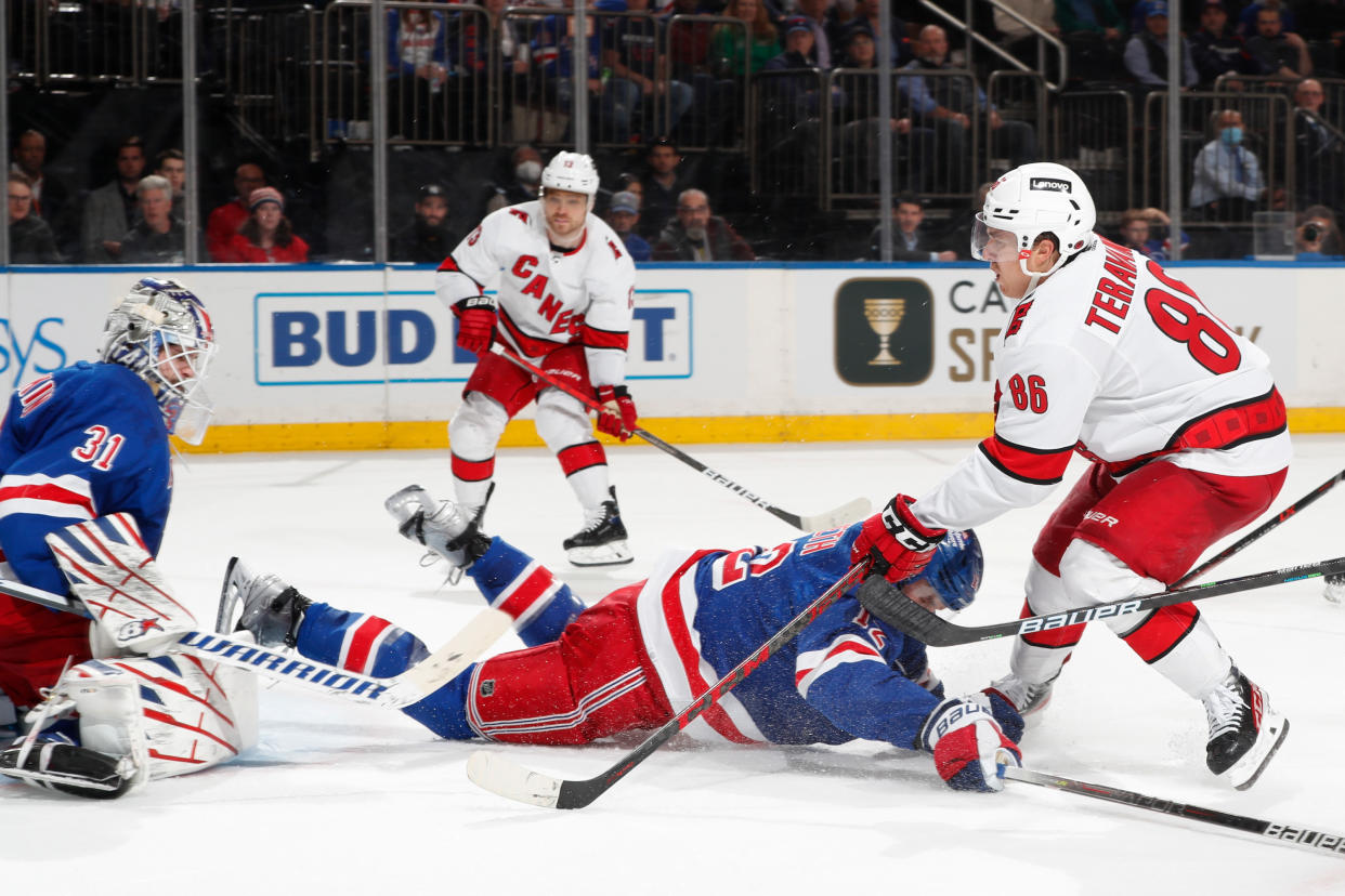 NEW YORK, NY - APRIL 26:  Teuvo Teravainen #86 of the Carolina Hurricanes shoots and scores in the second period against Igor Shesterkin #31 of the New York Rangers at Madison Square Garden on April 26, 2022 in New York City. (Photo by Jared Silber/NHLI via Getty Images)