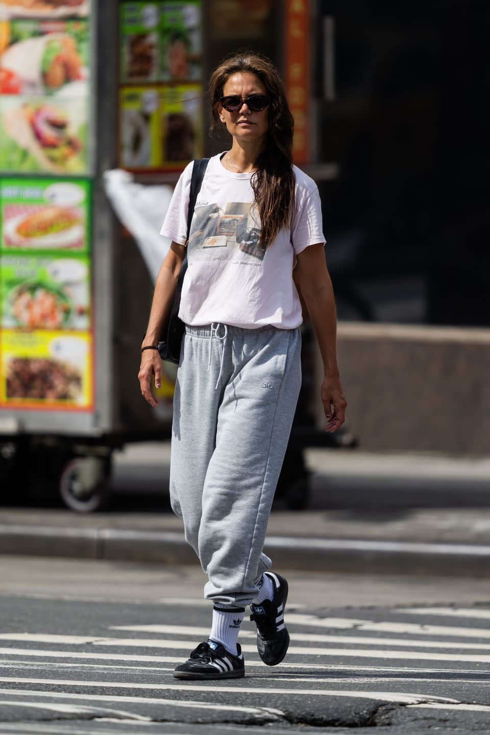 Katie Holmes Is All of Us As She Steps Out in Graphic Tee, Sweats, and Sneakers