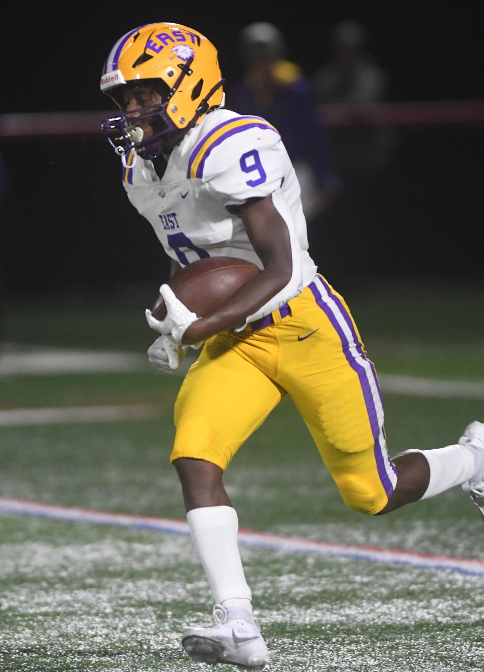 Ervin Wiggins Jr. looks downfield after hauling in a reception against Canandaigua.