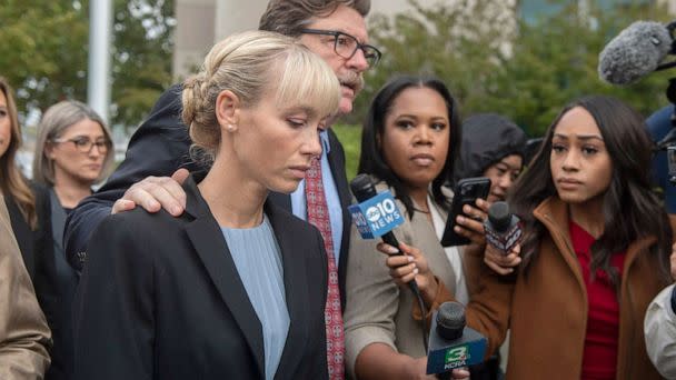 PHOTO: Surrounded by reporters, Sherri Papini arrives with her lawyer William Portanova for her sentencing hearing in downtown Sacramento, Calif,, Sept. 19, 2022. (Clifford Oto/The Stockton Record via USA Today Network)