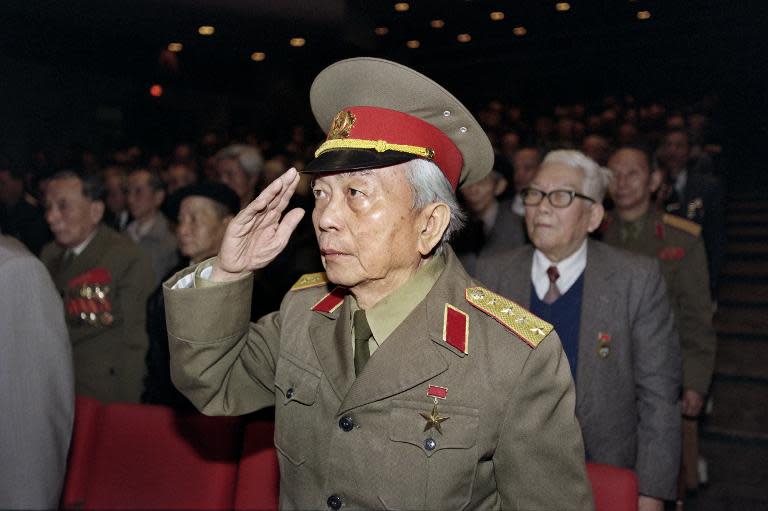 Retired General Vo Nguyen Giap, salutes during a meeting in Hanoi, December 19, 1996