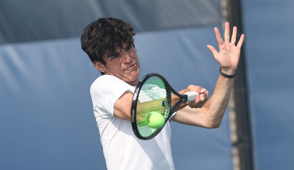 Mariemont player Will Stephens competes during a singles match at the district tennis tournament Saturday, May 21, 2022, at the Lindner Family Tennis Center.