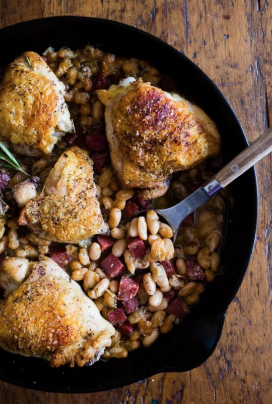 <p>Nutmeg Nanny</p><p>This chicken cannellini bean skillet is the perfect cozy winter meal you crave. Delicious white beans cooked with cubed sausage, onions and rosemary and topped with super crispy chicken thighs. This dish is hearty, delicious and full of flavor!</p><p><strong>Get the recipe: <a href="https://www.nutmegnanny.com/chicken-cannellini-bean-skillet/" rel="nofollow noopener" target="_blank" data-ylk="slk:Chicken Cannellini Bean Skillet;elm:context_link;itc:0;sec:content-canvas" class="link rapid-noclick-resp"><em>Chicken Cannellini Bean Skillet</em></a></strong></p>